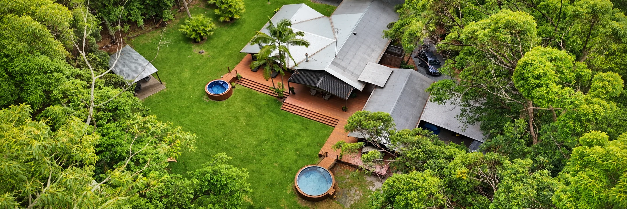 Aerial view of a garden, deck and pergola supplied by The Backyard Cowboys